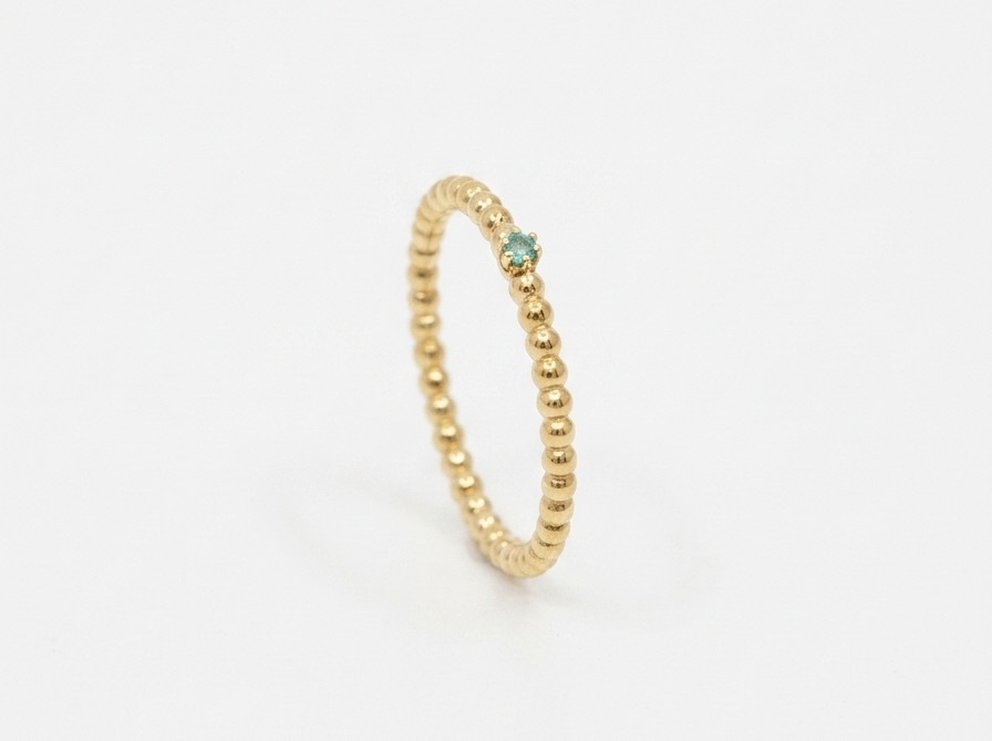 Ring in Gelbgold mit Paraiba Turmalin von Fabian Blaser